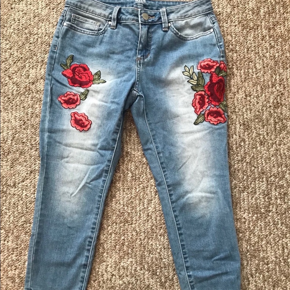 Woman’s cropped floral jeans
